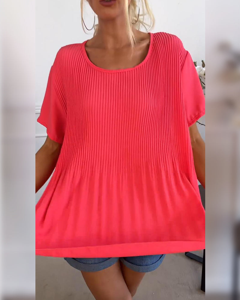 Blusa plissettata tinta unita con scollo tondo